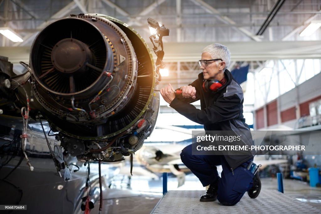Aircraft mechanic in the hangar