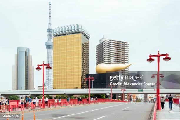 modern skyscrapers in asakusa district, tokyo, japan - ビアホール ストックフォトと画像