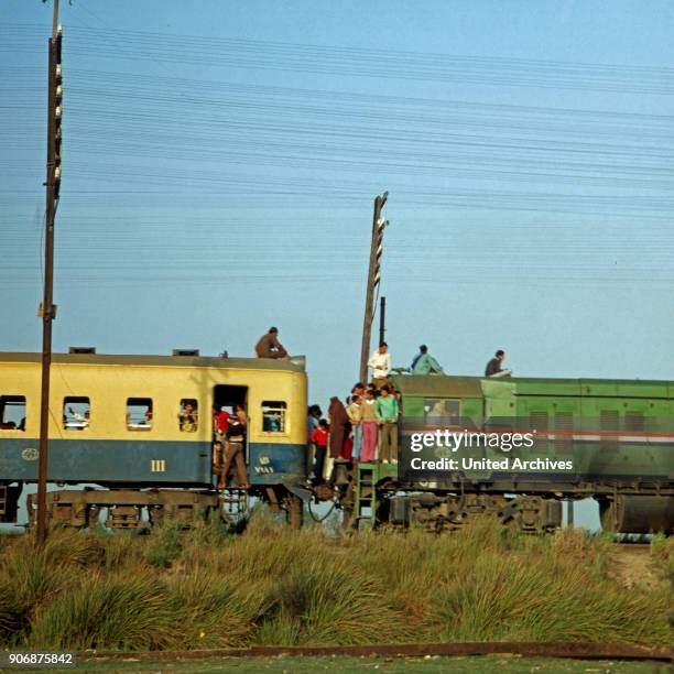 Public transport on a train near Cairo, Egypt, late 1970s.