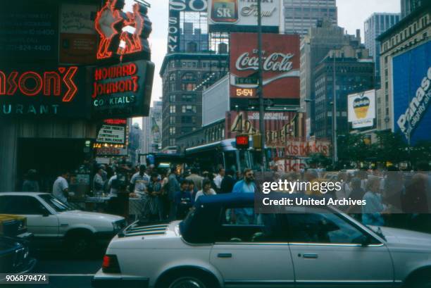 Intense activity at Times Square, New York City, New York, USA 1980s.