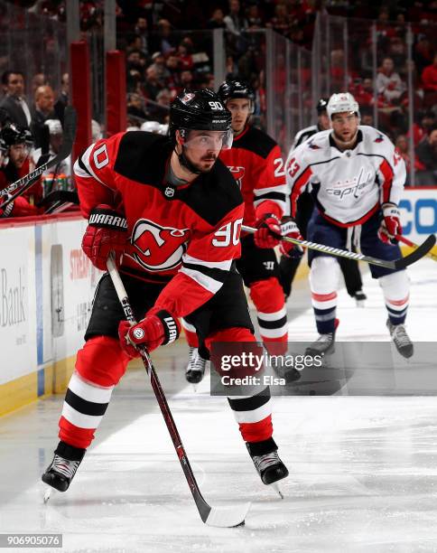Marcus Johansson of the New Jersey Devils takes the puck in the third period against the Washington Capitals on January 18, 2018 at Prudential Center...