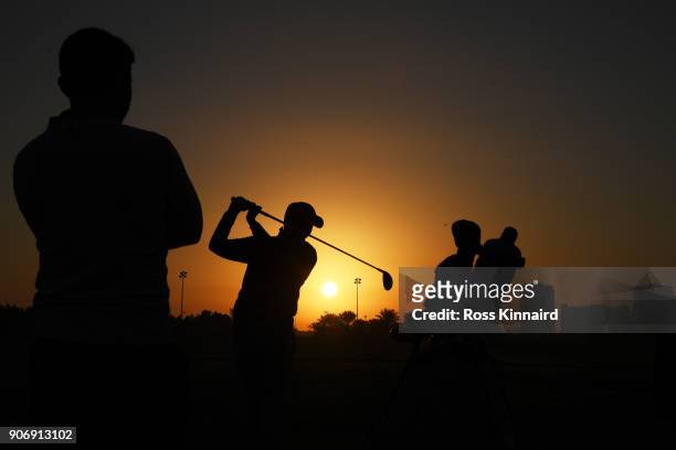 Matthew Fitzpatrick of England warms up on the range prior to round two of the Abu Dhabi HSBC Golf Championship at Abu Dhabi Golf Club on January 19,...