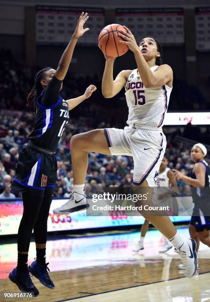 Connecticut's Gabby Williams drives to the basket against Tulsa's Shug Dickson at Gampel Pavilion in Storrs, Conn., on Thursday, Jan. 18, 2018. UConn...