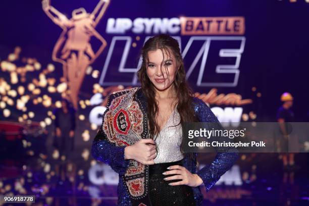 Hailee Steinfeld poses with the the LSB Championship belt onstage during Lip Sync Battle Live: A Michael Jackson Celebration at Dolby Theatre on...