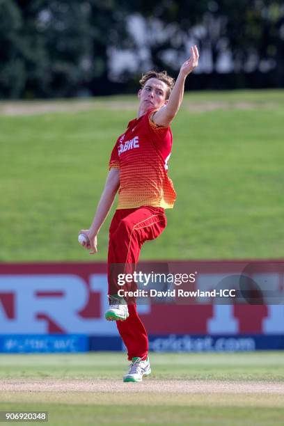 Captain Liam Roche of Zimbabwe bowls during the ICC U19 Cricket World Cup match between India and Zimbabwe at Bay Oval on January 19, 2018 in...