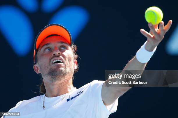 Alexandr Dolgopolov of Ukraine serves in his third round match against Diego Schwartzman of Argentina on day five of the 2018 Australian Open at...