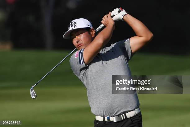 Hideto Tanihara of Japan plays his second shot on the sixth hole during round two of the Abu Dhabi HSBC Golf Championship at Abu Dhabi Golf Club on...