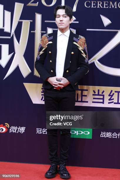 Singer Dimash Kudaibergen poses on the red carpet of 2017 Weibo Awards Ceremony at National Aquatics Center on January 18, 2018 in Beijing, China.