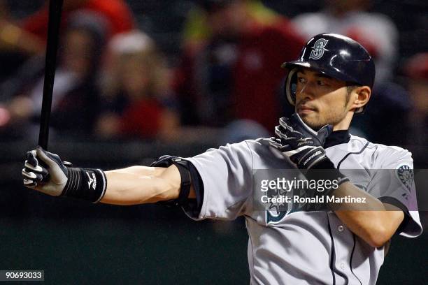 Right fielder Ichiro Suzuki of the Seattle Mariners hits a solo homerun against the Texas Rangers in the third inning on September 12, 2009 at the...