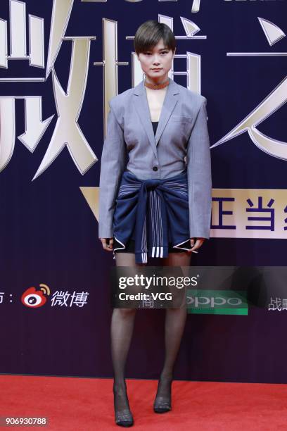 Singer Chris Lee poses on the red carpet of 2017 Weibo Awards Ceremony at National Aquatics Center on January 18, 2018 in Beijing, China.