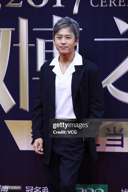 Actor Deng Chao poses on the red carpet of 2017 Weibo Awards Ceremony at National Aquatics Center on January 18, 2018 in Beijing, China.