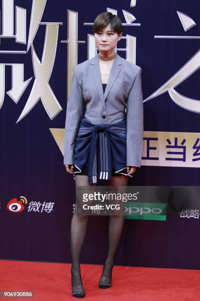 Singer Chris Lee poses on the red carpet of 2017 Weibo Awards Ceremony at National Aquatics Center on January 18, 2018 in Beijing, China.
