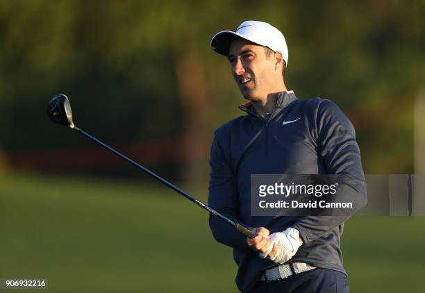 Ross Fisher of England plays his second shot on the par 5, 10th hole during the second round of the 2018 Abu Dhabi HSBC Golf Championship at the Abu...