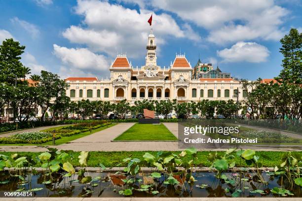 saigon city hall, ho chi minh city, vietnam - vietnamese flag stock pictures, royalty-free photos & images