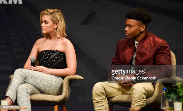 Actress Olivia Holt of "Marvel's Cloak & Dagger" and Aubrey Joseph speaks on stage at Freeform Summit on January 18, 2018 in Hollywood, California.