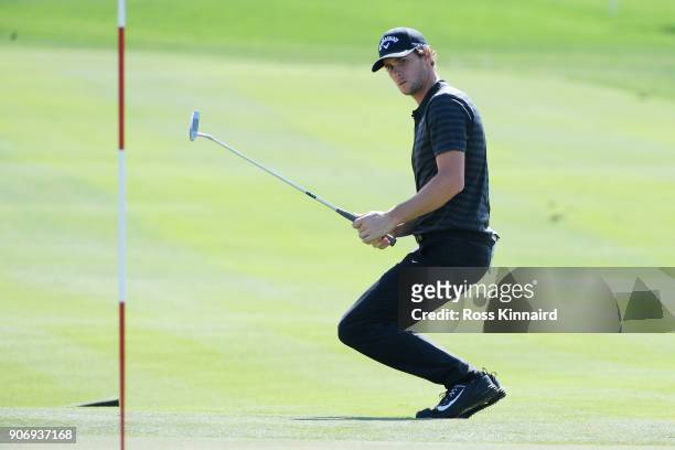 Thomas Pieters of Belgium reacts to his birdie attempt on the eighth green during round two of the Abu Dhabi HSBC Golf Championship at Abu Dhabi Golf...