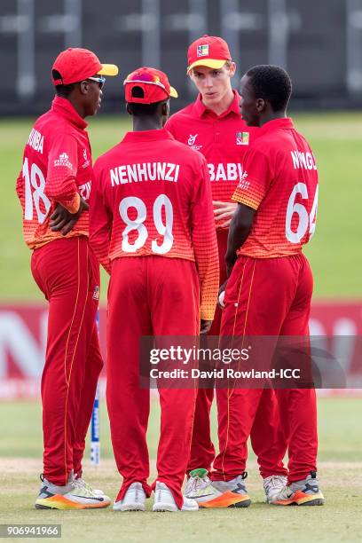 Captain Liam Roche of Zimbabwe speaks to players during the ICC U19 Cricket World Cup match between India and Zimbabwe at Bay Oval on January 19,...