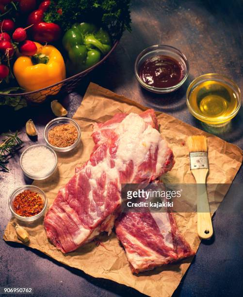 fresh raw pork ribs - butcher paper stock pictures, royalty-free photos & images