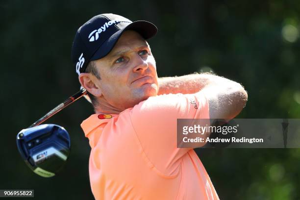 Justin Rose of England plays his shot from the fifth tee during round two of the Abu Dhabi HSBC Golf Championship at Abu Dhabi Golf Club on January...