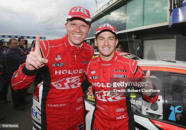 Will Davison and Garth Tander of the Holden Racing Team celebrate after winning race 17 for round nine of the V8 Supercar Championship Series at the...