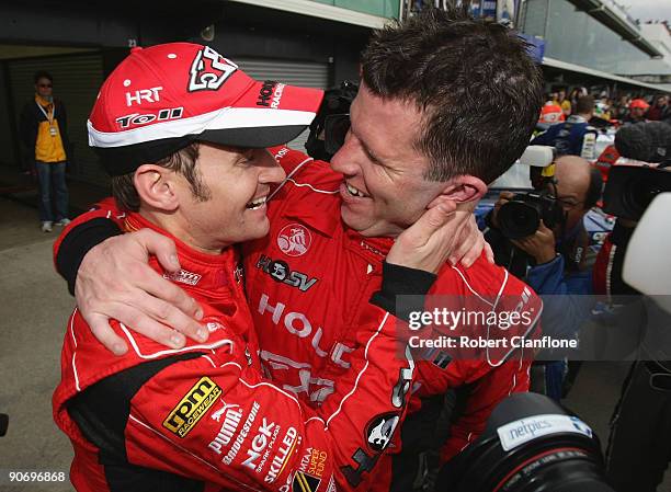 Will Davison and Garth Tander of the Holden Racing Team celebrate after winning race 17 for round nine of the V8 Supercar Championship Series at the...