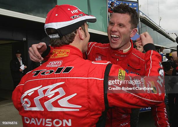 Will Davison and Garth Tander of the Holden Racing Team celebrate after winning race 17 for round nine of the V8 Supercar Championship Series at the...