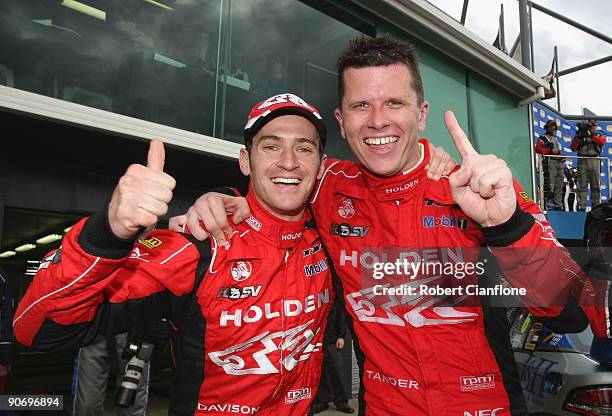 Will Davison and Garth Tander of the Holden Racing Team celebrate after winning race 17 for round nine of the V8 Supercar Championship Series at the...