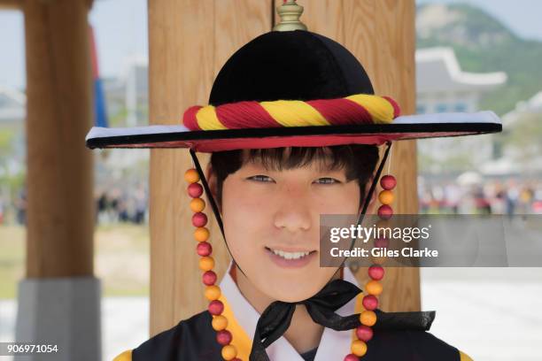 Young man from Andong village poses for a photograph. The Hahoe Folk Village is a traditional village from the Joseon Dynasty. The 'Ha' is short for...