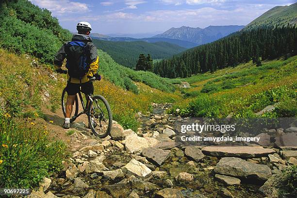mountain biker landscape mountains - colorado stock pictures, royalty-free photos & images