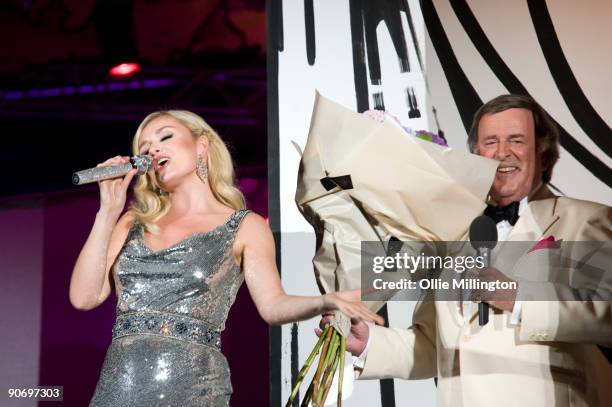 Katherine Jenkins sings beside presenter Terry Wogan during the BBC Proms In The Park on stage and live on The BBC at Hyde Park on September 12, 2009...