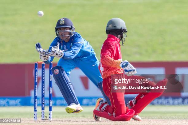 Wicketkeeper Harvik Desai of India attempts to catch the ball off Nkosilathi Nungu of Zimbabwe during the ICC U19 Cricket World Cup match between...