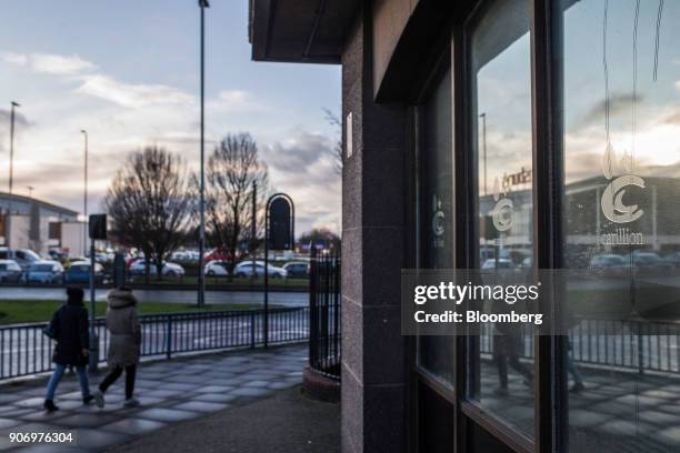 Pedestrians pass the Carillion Plc headquarter offices in Wolverhampton, U.K., on Thursday, Jan. 18, 2018. The Wolverhampton, central England-based...