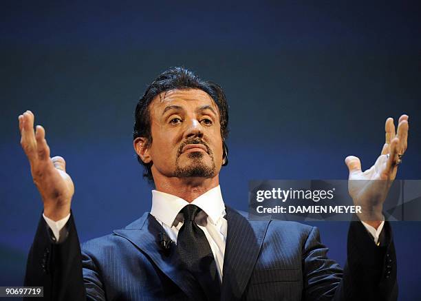 Actor Silvester Stallone delivers an address before receiving the "Jaeger-Lecoultre glory to the filmmaker" award during a ceremony at the Venice...