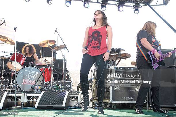 Drummer Amy Cesari, singer Brett Anderson and bassist Maya Ford of the rock group The Donnas perform on Day 3 of the 2nd Annual Sunset Strip Music...