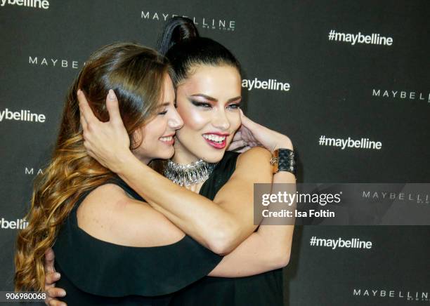 German model Carina Zavline and Brasil model Adriana Lima during the Maybelline Show 'Urban Catwalk - Faces of New York' at Vollgutlager on January...