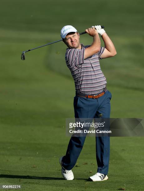 Richard Sterne of South Africa plays his third shot on the second hole during the second round of the 2018 Abu Dhabi HSBC Golf Championship at the...