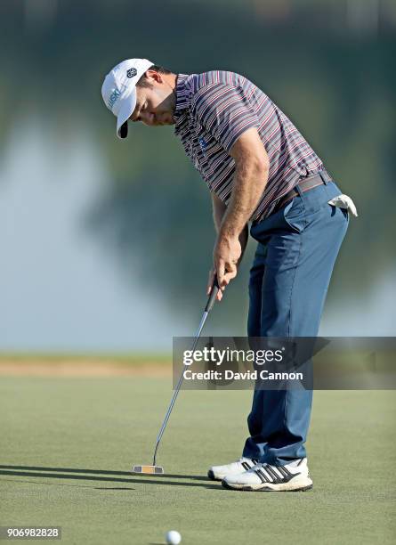 Richard Sterne of South Africa hits a putt on the fourth hole during the second round of the 2018 Abu Dhabi HSBC Golf Championship at the Abu Dhabi...