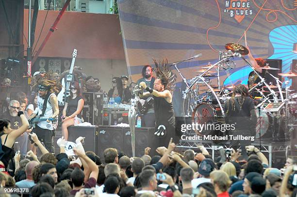 Bassist Reginald Arvizu, singer Jonathan Davis and guitarist James Shaffer of the rock group Korn perform on Day 3 of the 2nd Annual Sunset Strip...