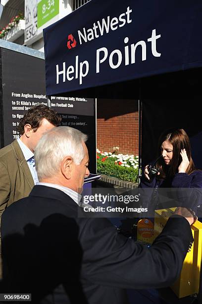 Spectators visit the NatWest Help Point during the 4th NatWest One Day International between England and Australia at Lord's on September 12, 2009 in...