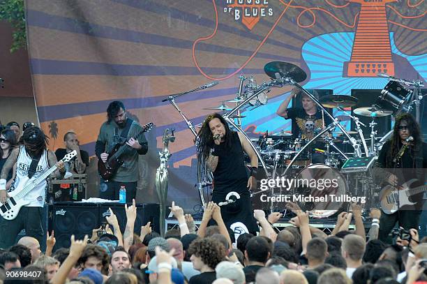 Bassist Reginald Arvizu , singer Jonathan Davis , drummer Ray Luzier and guitarist James Shaffer of the rock group Korn perform on Day 3 of the 2nd...