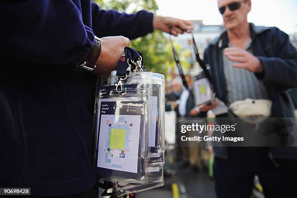 Spectator collects a map of Lord's during the 4th NatWest One Day International between England and Australia at Lord's on September 12, 2009 in...