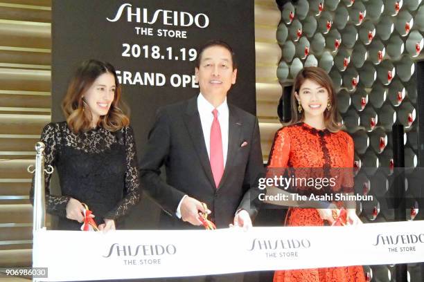 Shiseido President Masahiko Uotani and models Izumi Mori and Hikari Mori attend the 'Shiseido The Store' opening ceremony on January 18, 2018 in...