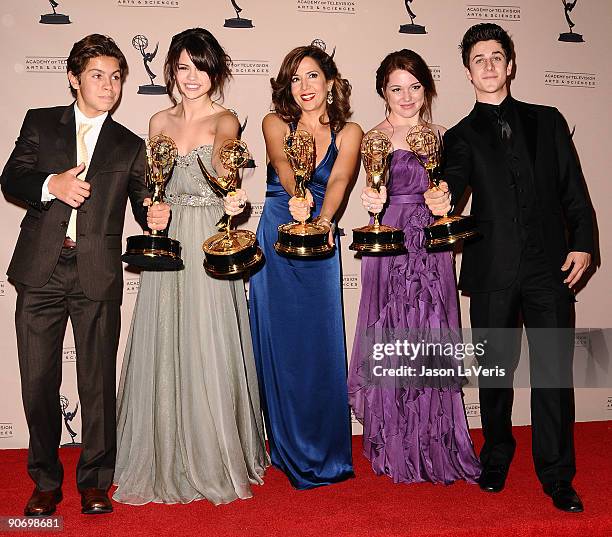 Jake T. Austin, Selena Gomez, Maria Canals-Barrera, Jennifer Stone and David Henrie pose for photos in the press room at the 2009 Creative Arts Emmy...