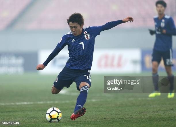 Teruki Hara of Japan controls the ball during their AFC Under-23 Championship football match against Uzbekistan in Nanjing, in China's Jiangsu...