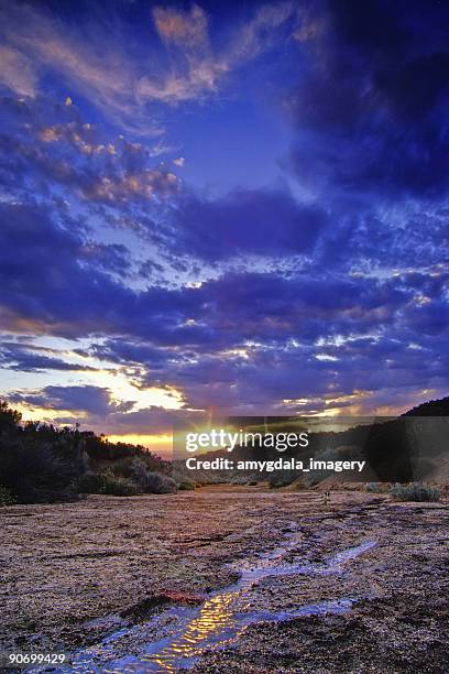 landscape sunset sky stream reflection - albuquerque new mexico stock pictures, royalty-free photos & images