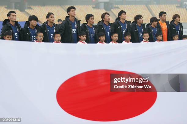 Players of Japan line up for team photos prior to AFC U23 Championship Quarter-final between Japan and Uzbekistan at Jiangyin Sports Center on...