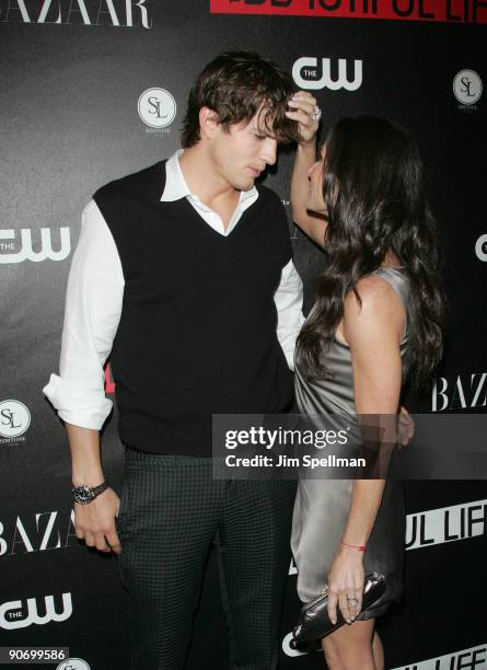 Actors Ashton Kutcher and Demi Moore attend the CW Network celebration of its new series "The Beautiful Life: TBL" at the Simyone Lounge on September...