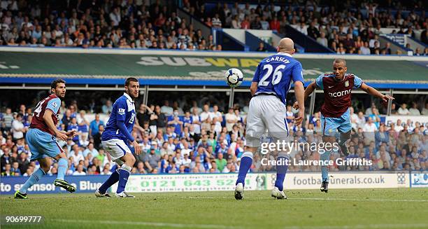 Gabriel Agbonlahor of Aston Villa scores the first goal during the Barclays Premier League match between Birmingham City and Aston Villa at St....