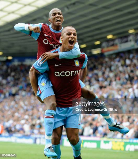 Gabriel Agbonlahor and Ashley Young of Aston Villa celebratevictory on the final whistle during the Barclays Premier League match between Birmingham...