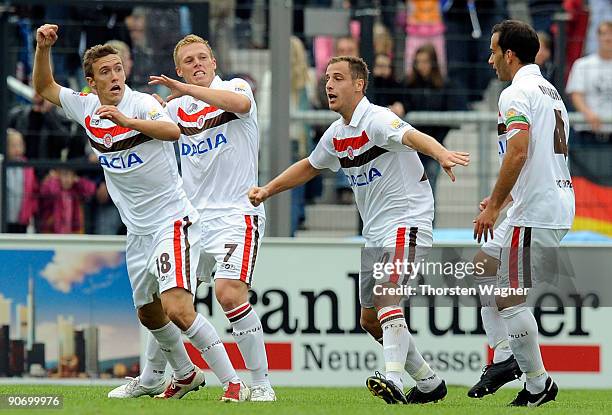 Matthias Lehmann of St. Pauli celebrates with his team mates Max Kruse , Rouwen Hennings and Fabio Morena after scoring the 3:2 during the 2....